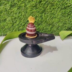Mini Trishul-Topped Narmadeshwar Shivling with Black Yoni