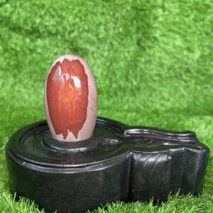 Natural Sacred Red Pattern Shiva Lingam with Black Stone Yoni Base